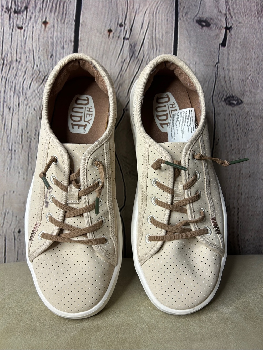 Hey Dude women’s Cody w/ perf. Leather. Color says pink, I think tan USW9